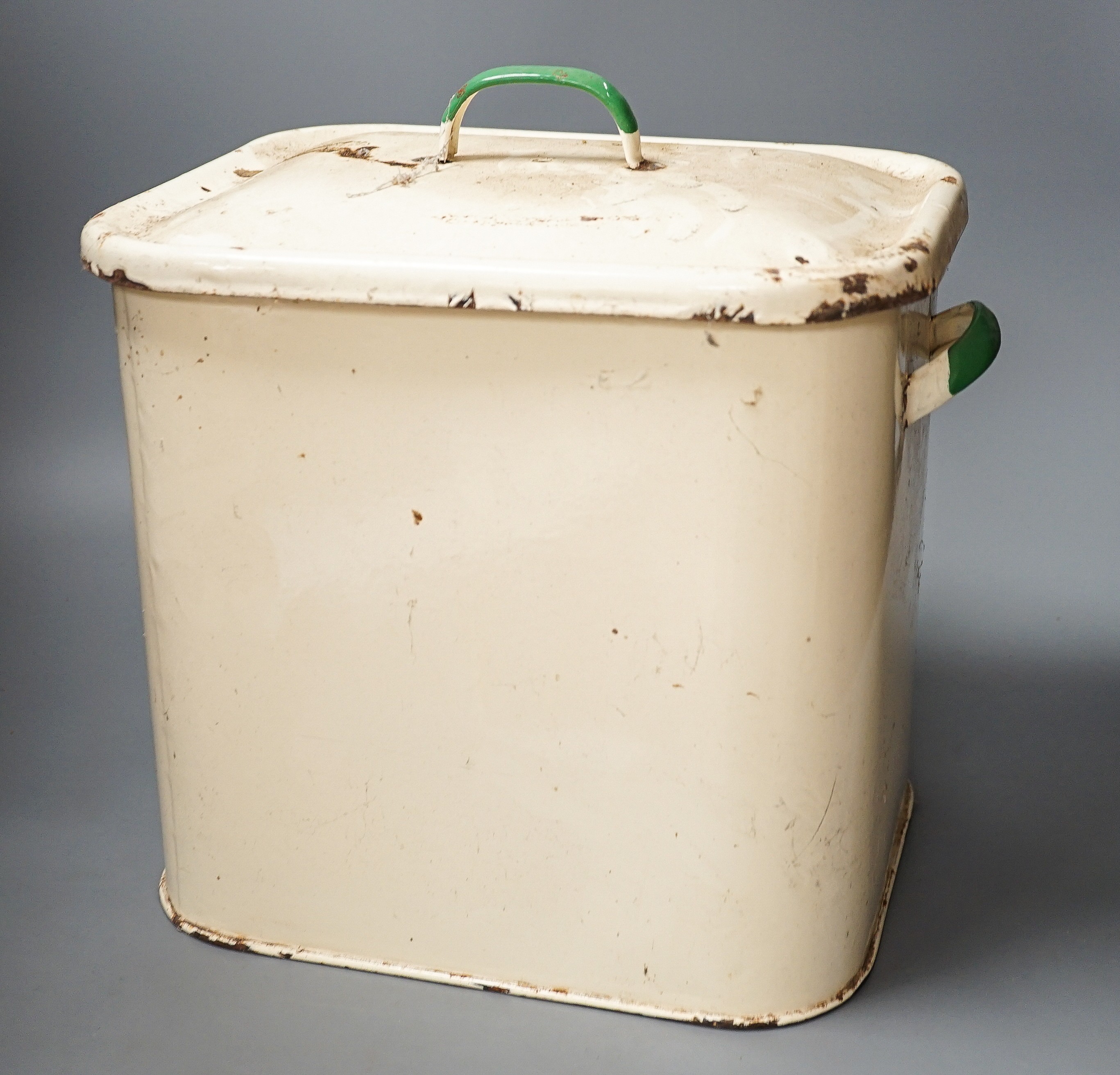 An enamelled lidded bread box